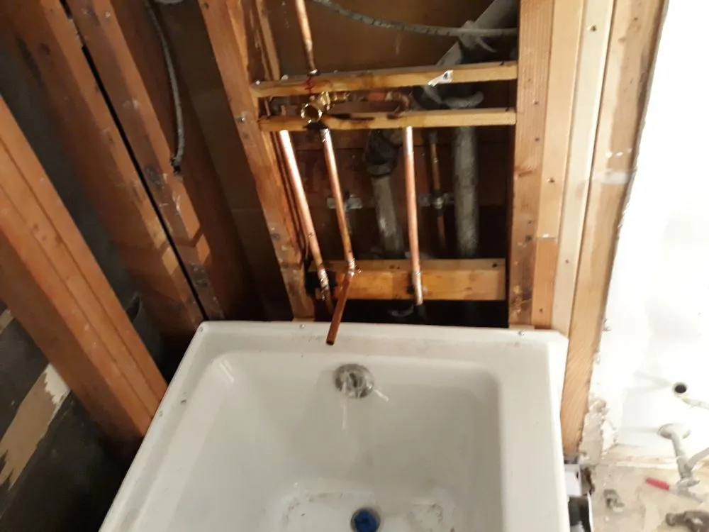 Slide of Carlos Plumbing Service