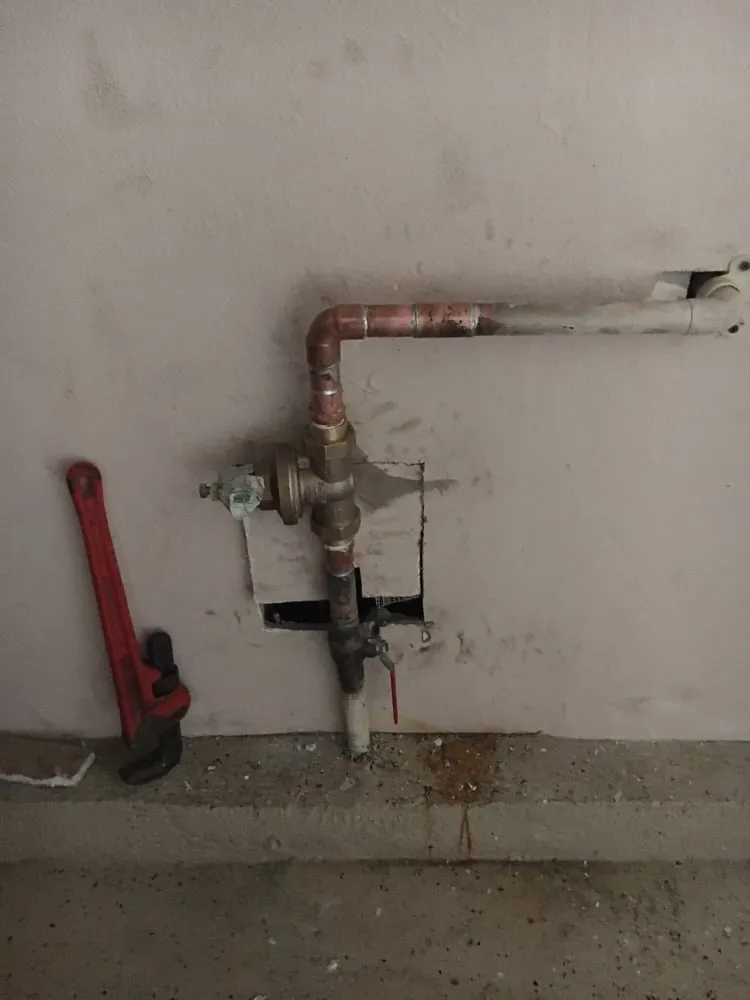 Slide of CET Plumbing and Drain Services