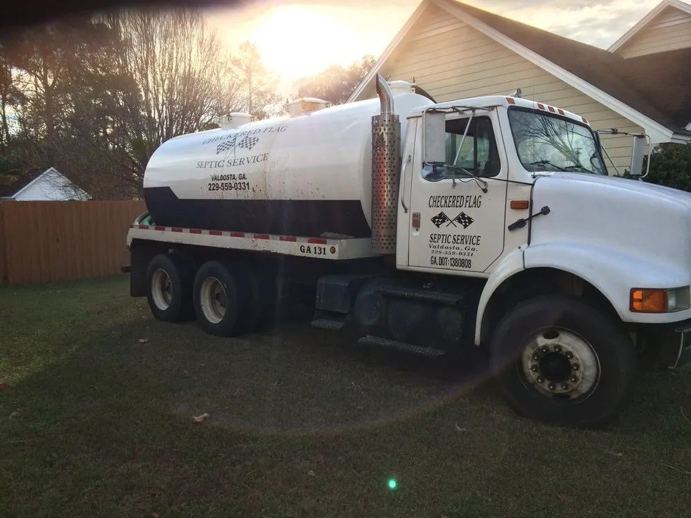 Slide of Checkered Flag Septic Service
