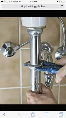 Chris Woolley Plumbing Logo