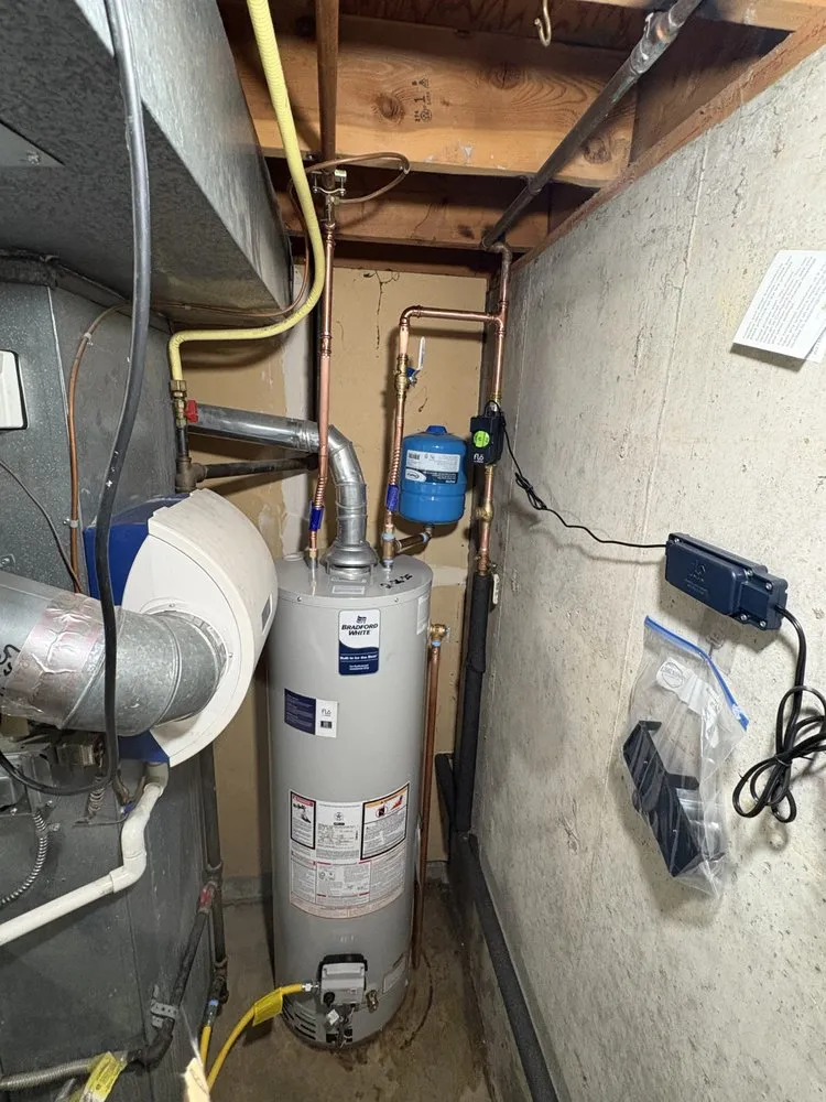 Slide of C&J Plumbing and Heating