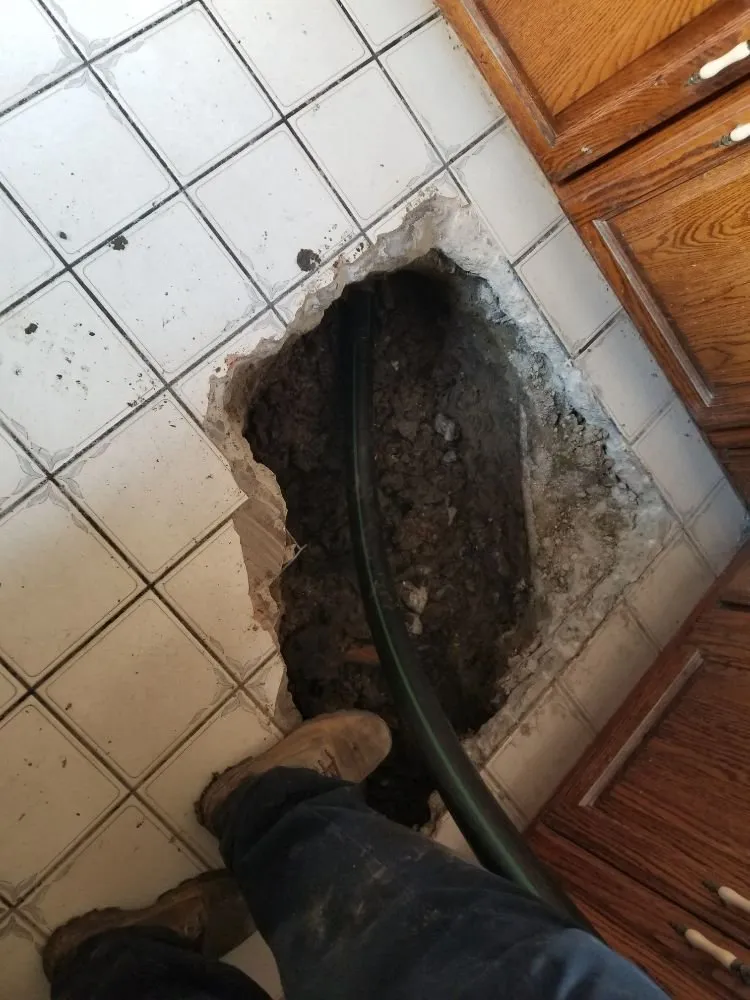 Slide of CJ's Plumbing N Rooter