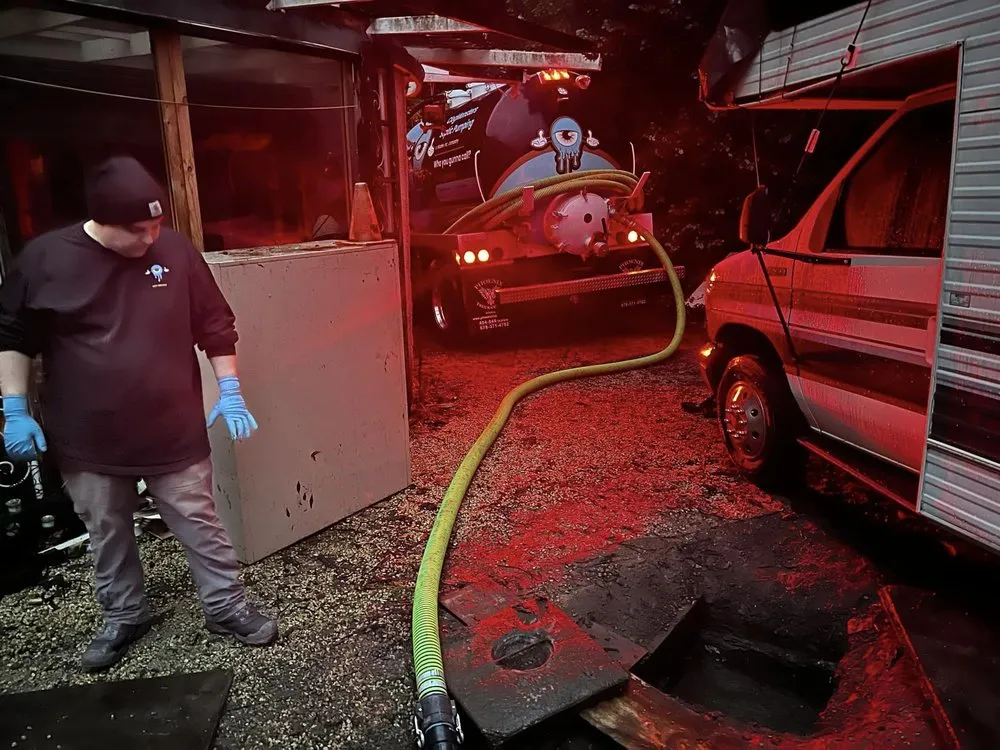 Slide of Clog Monsters Septic Puming