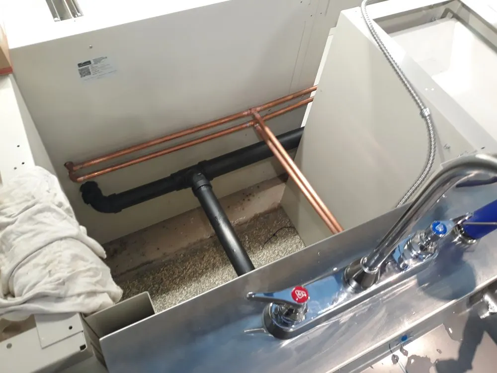 Slide of Cooper's Plumbing