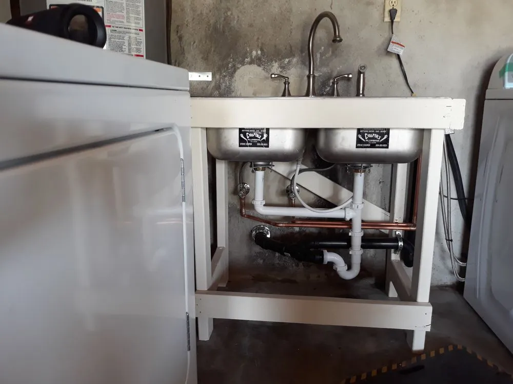 Slide of Cooper's Plumbing