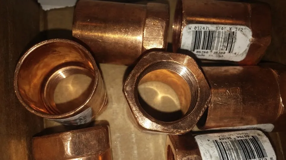 Slide of Copper Pipe Plumbing Services