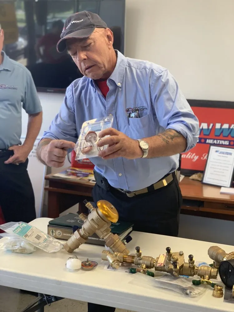 Slide of Dan Wood Plumbing, Heating, Cooling, & Electrical