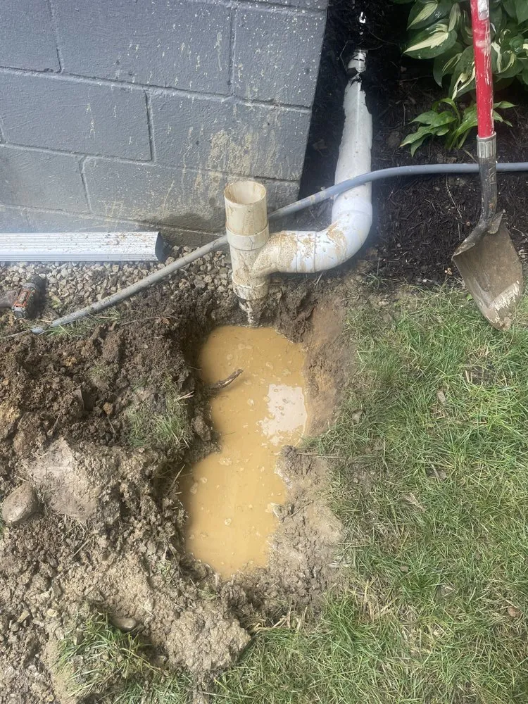 Slide of Dan's Drain Services