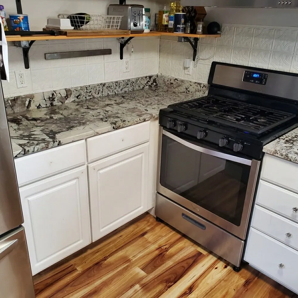 Slide of Dan's Granite and Renovations