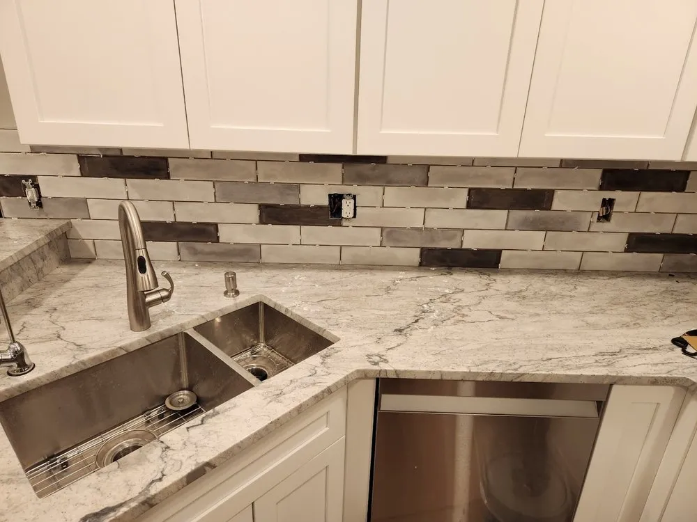 Slide of Dan's Granite and Renovations