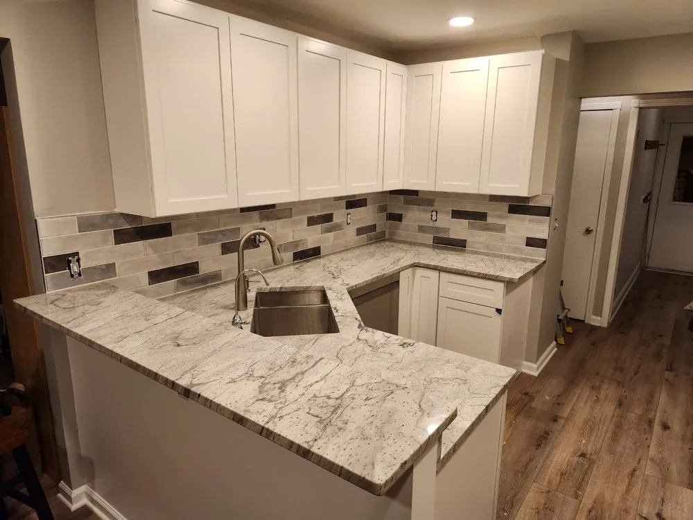 Slide of Dan's Granite and Renovations