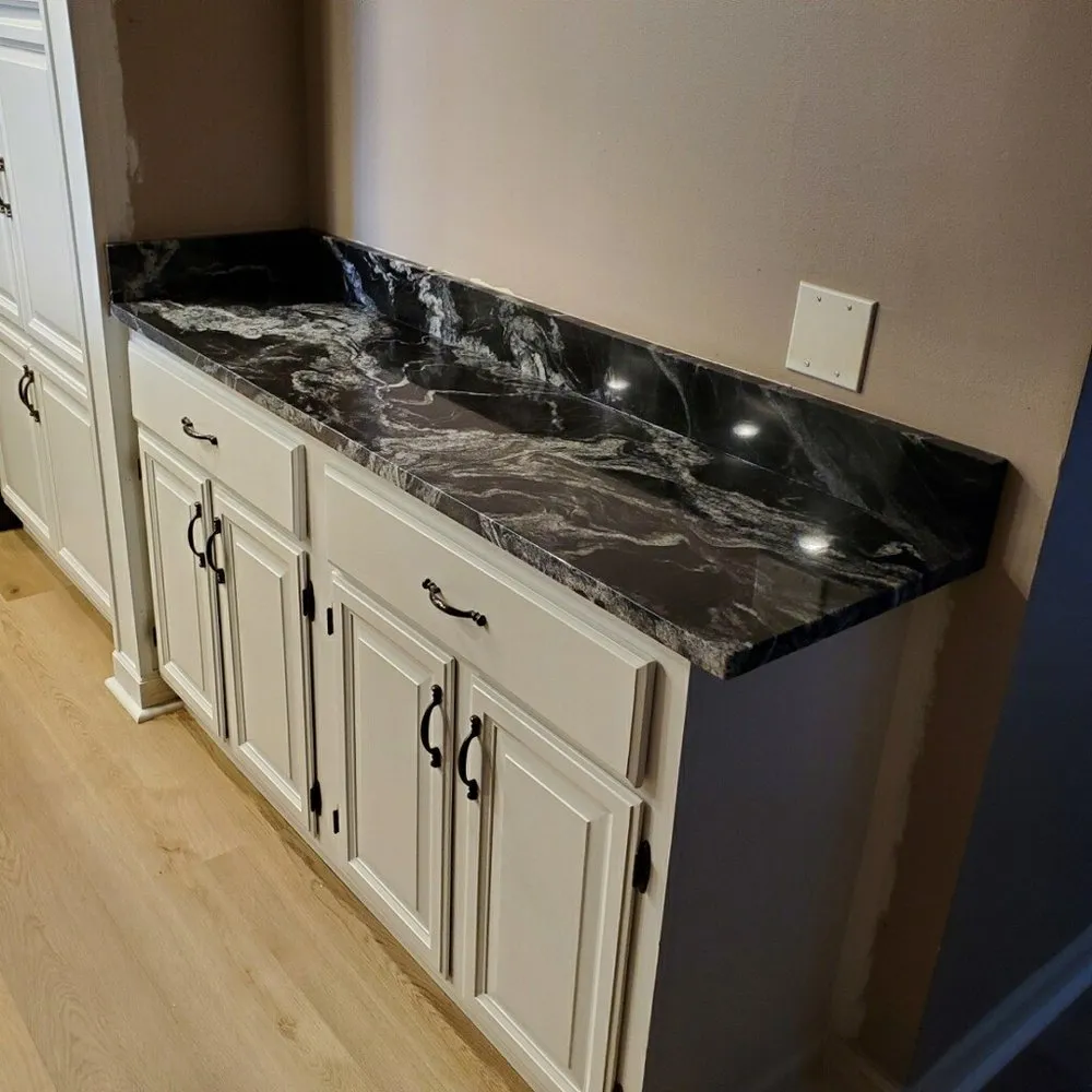 Slide of Dan's Granite and Renovations