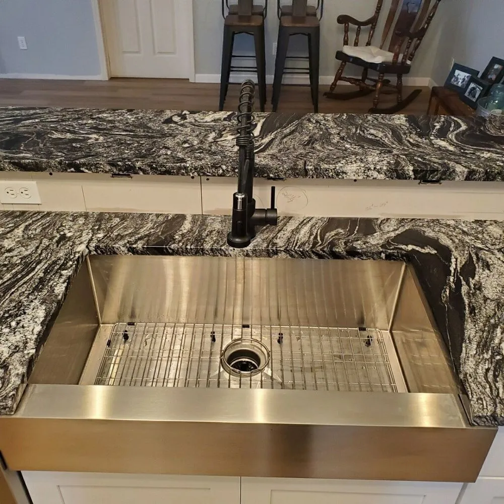 Slide of Dan's Granite and Renovations