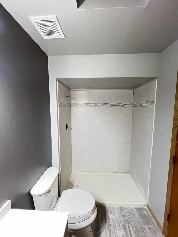 Slide of D&D plumbing and Remodeling