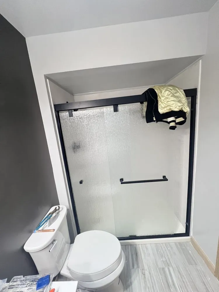 Slide of D&D plumbing and Remodeling