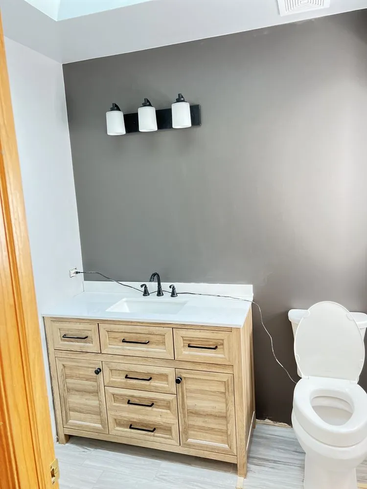 Slide of D&D plumbing and Remodeling