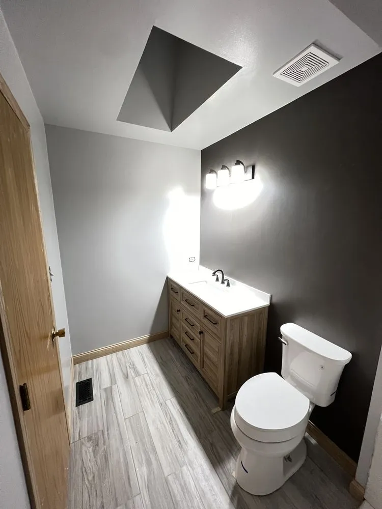 Slide of D&D plumbing and Remodeling