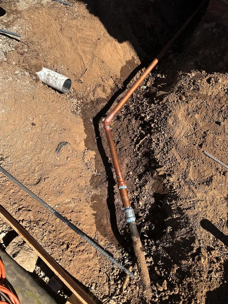 Slide of De Leon Plumbing