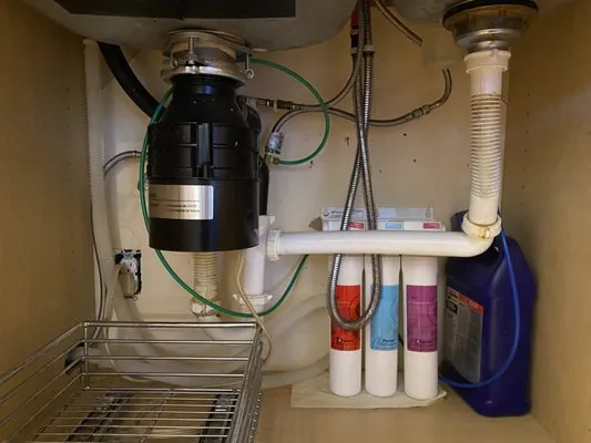 Deals On Wheels Plumbing Logo