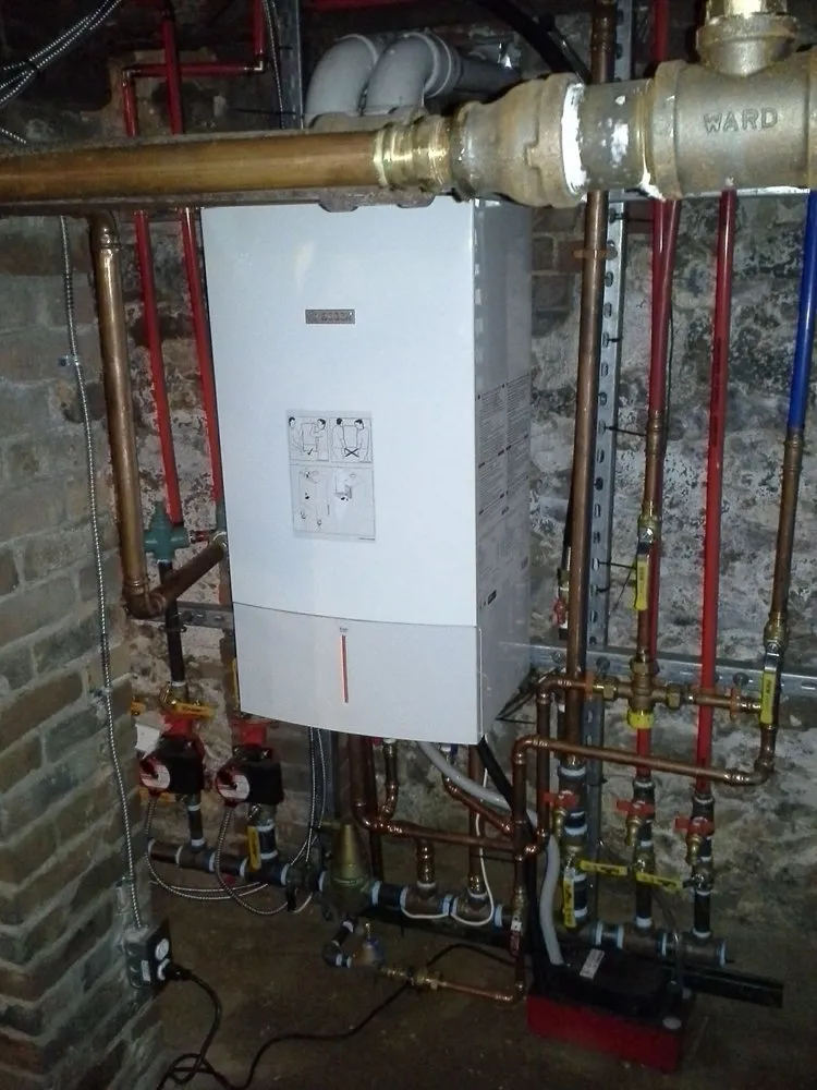 Slide of Deluxe Plumbing & Heating