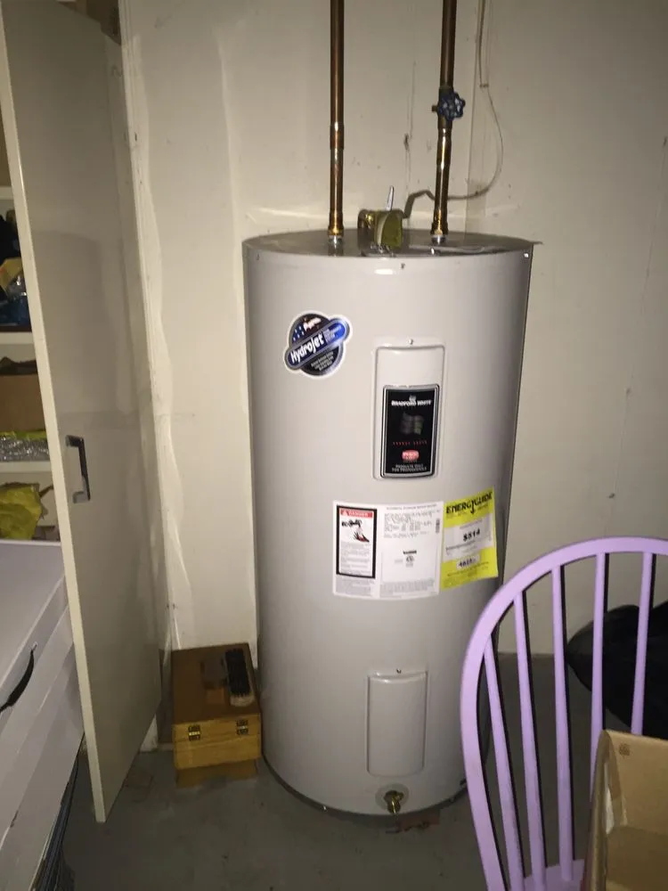 Slide of Deluxe Plumbing & Heating