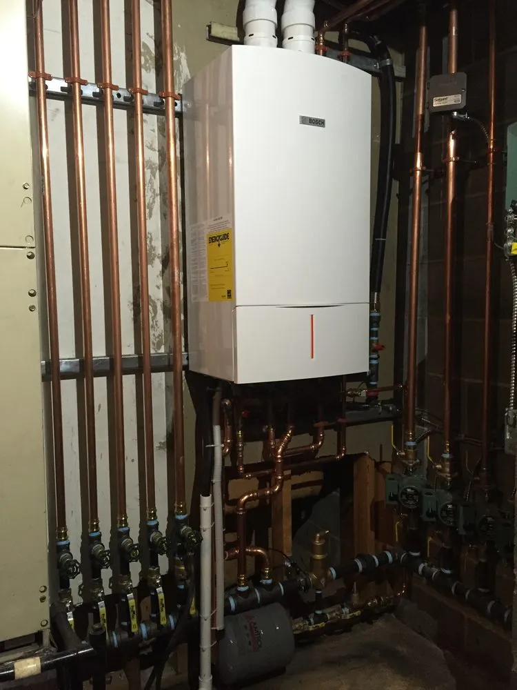 Slide of Deluxe Plumbing & Heating