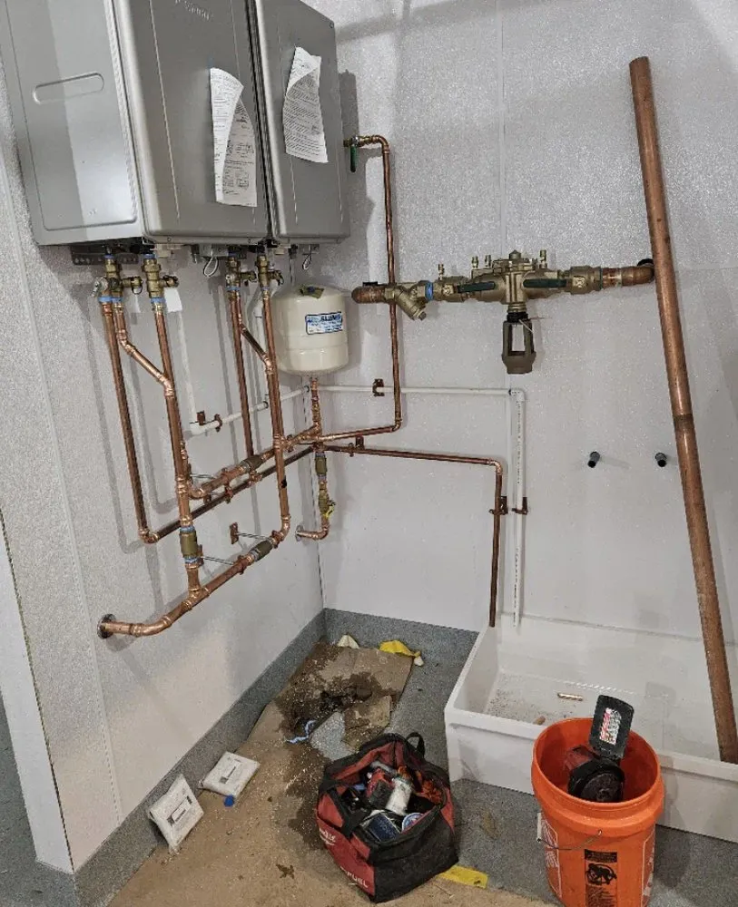 Slide of DFW Genesis Plumbing