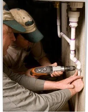 Slide of Dial One L. V. Lewis Plumbing