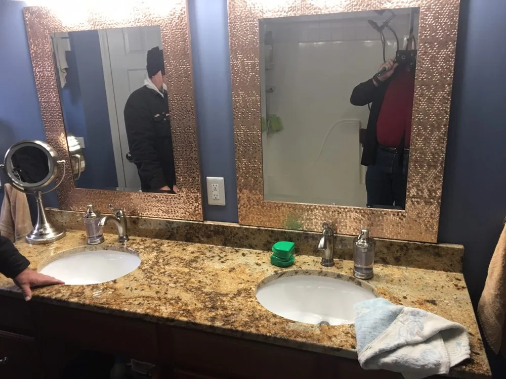 Slide of Dial One L. V. Lewis Plumbing