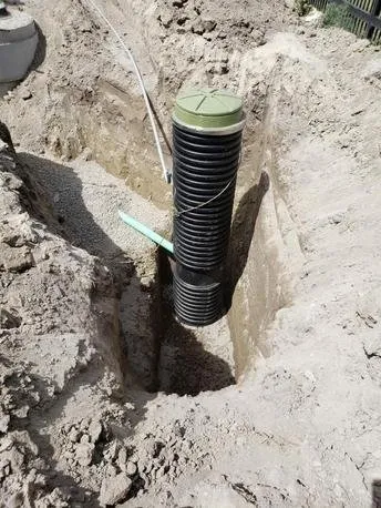 Slide of Dick's Backhoe & Sewer Connection