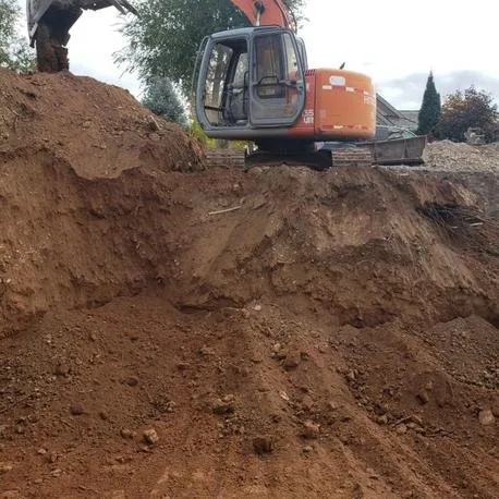 Slide of Dick's Backhoe & Sewer Connection