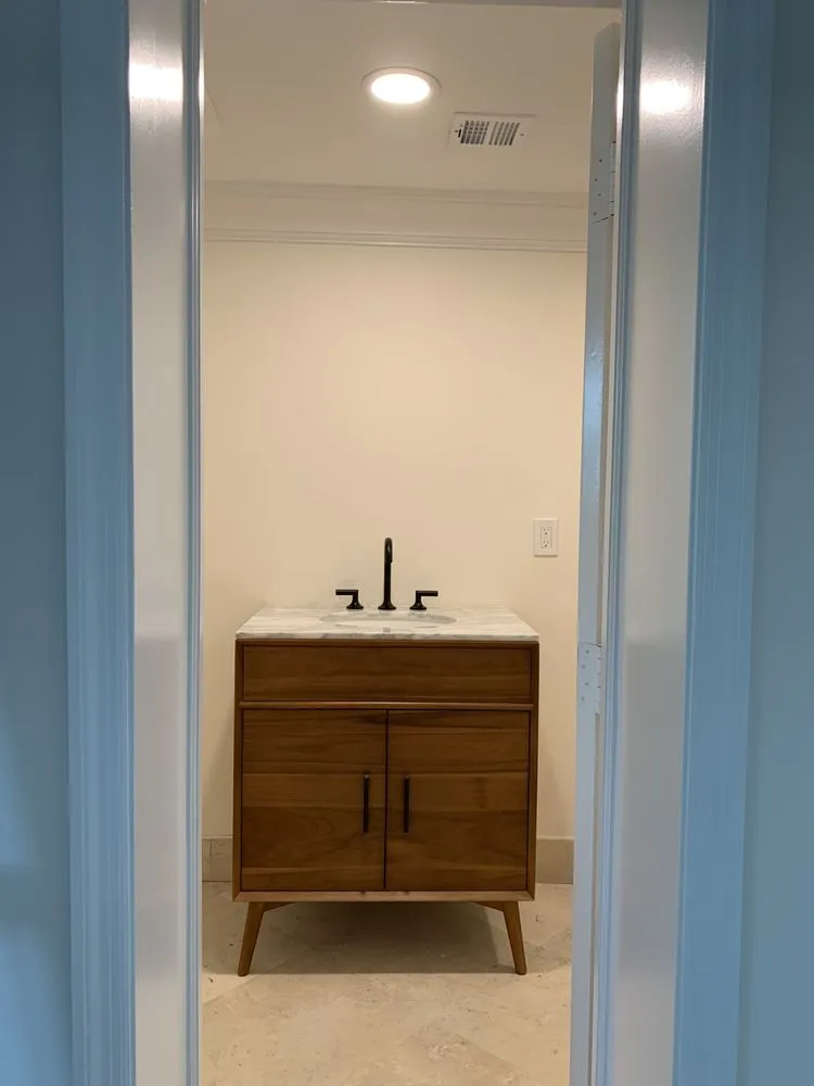 Slide of Dima Handymen and Electrical Team