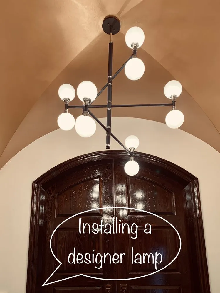 Slide of Dima Handymen and Electrical Team