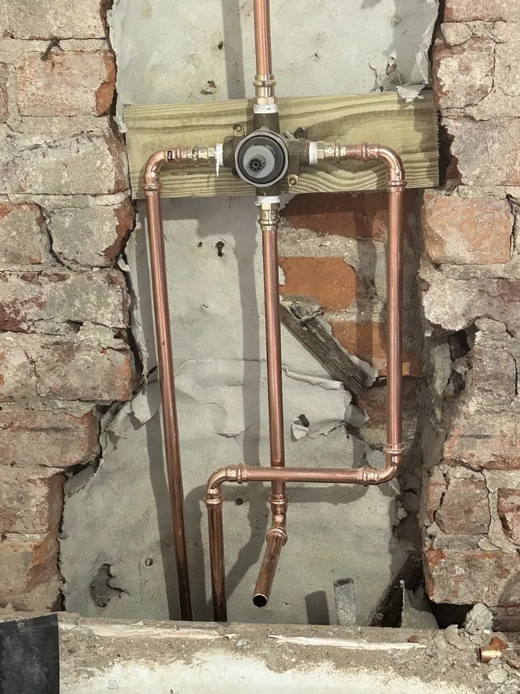 Slide of DJ's Plumbing & Electrical