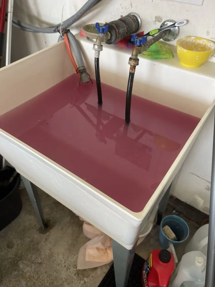 Slide of Down The Drain Plumbing & Rooter