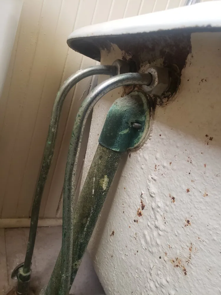 Slide of Down The Drain Plumbing & Rooter