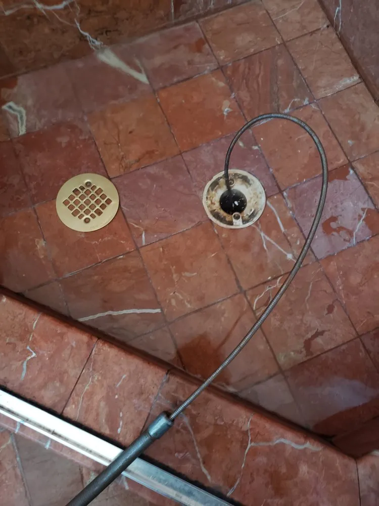 Slide of Down The Drain Plumbing & Rooter