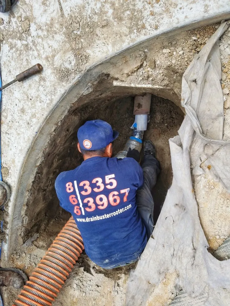 Slide of Drain Buster Rooter and Plumbing