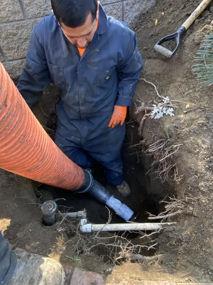 Slide of Drain Buster Rooter and Plumbing