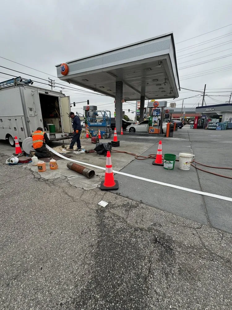 Slide of Drain Buster Rooter and Plumbing