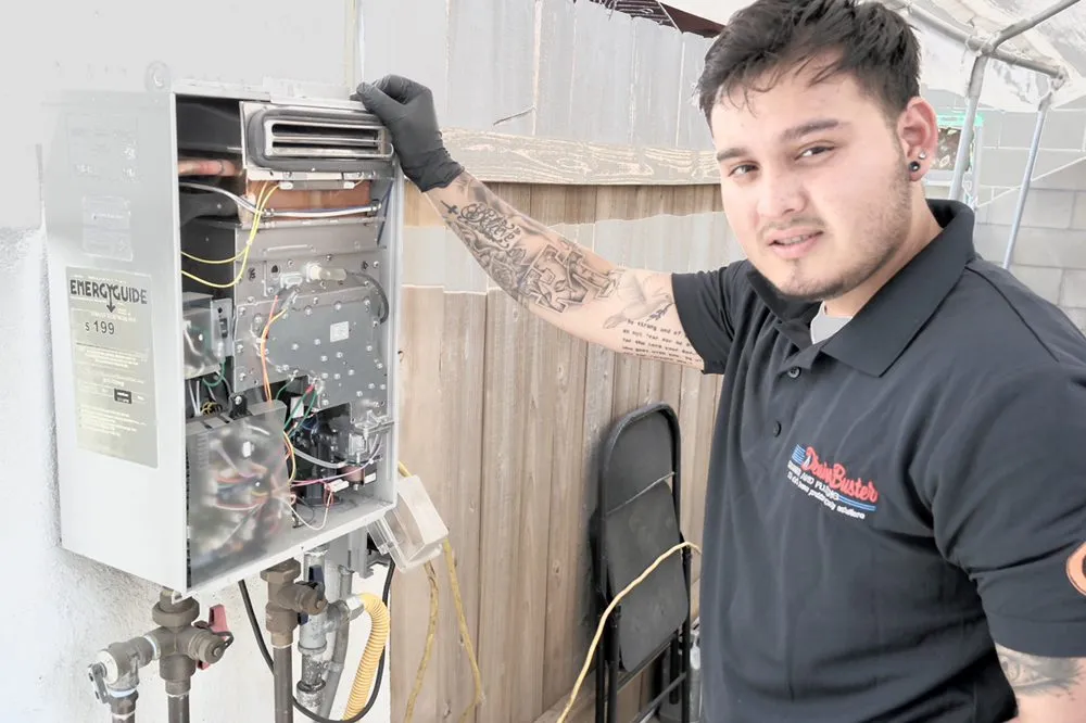 Slide of Drain Buster Rooter and Plumbing