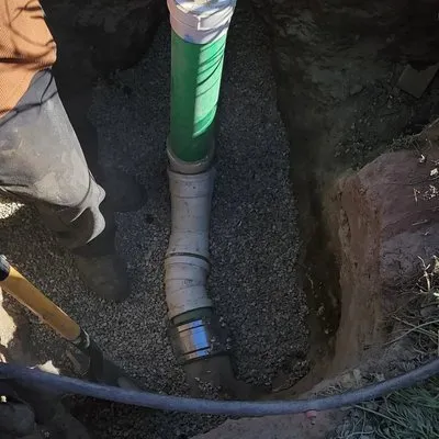 Drain Charmer Plumbing & Rooter Logo