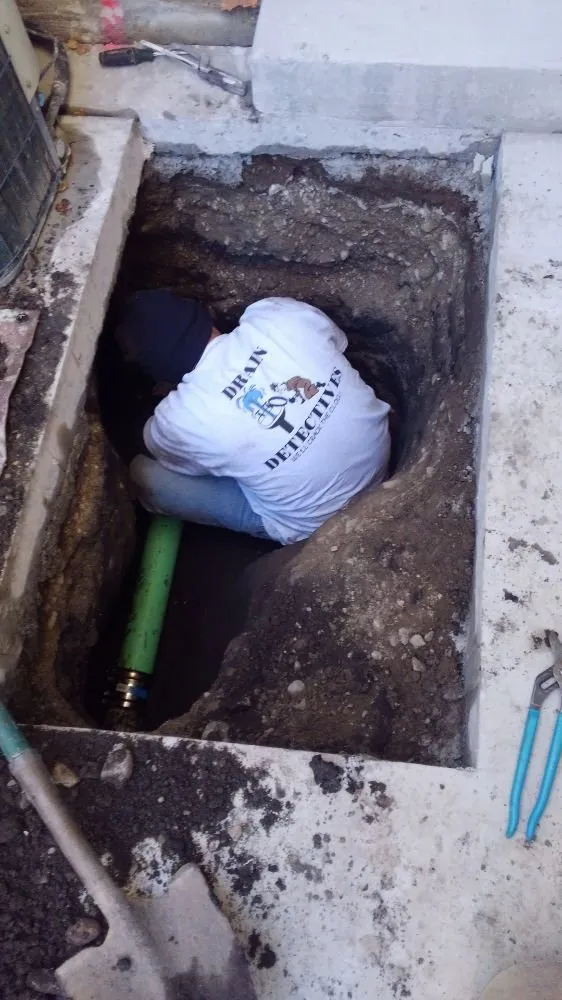 Slide of Drain Detectives