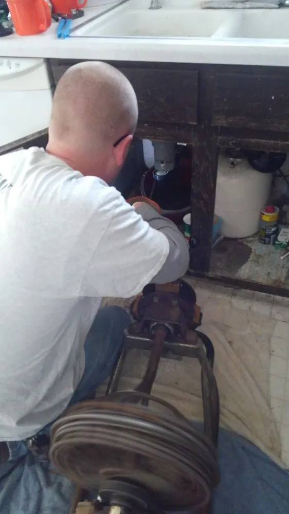 Slide of Drain Detectives