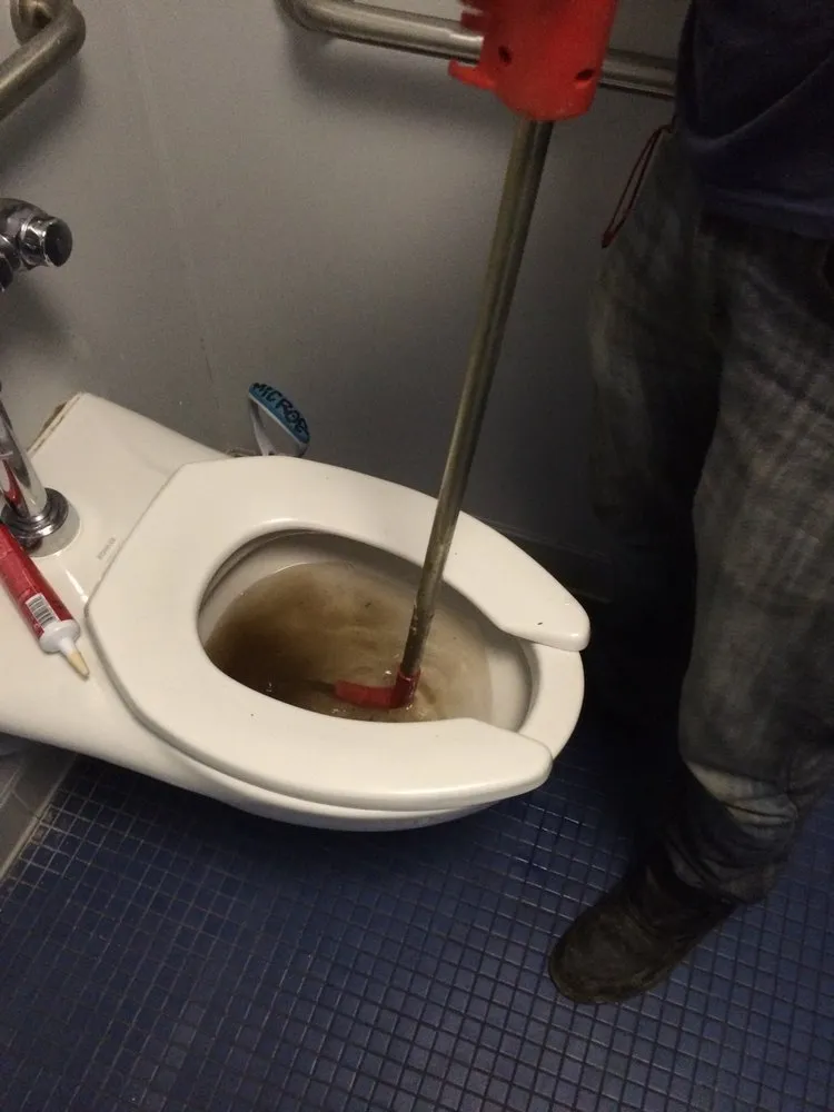 Slide of Drain Man Plumbing