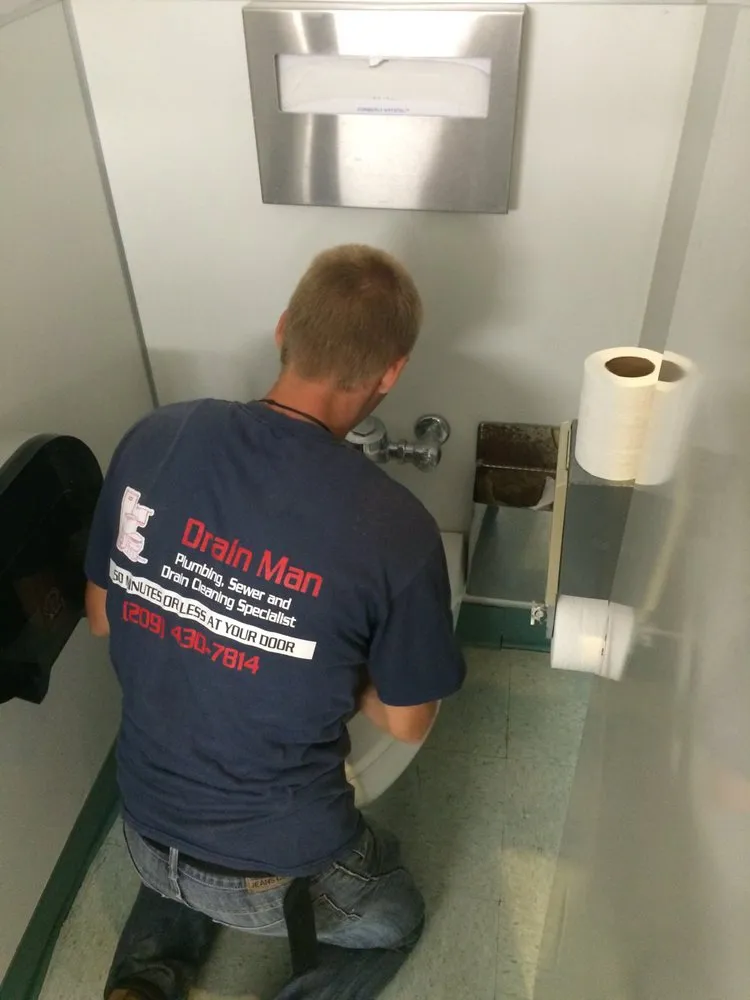 Slide of Drain Man Plumbing