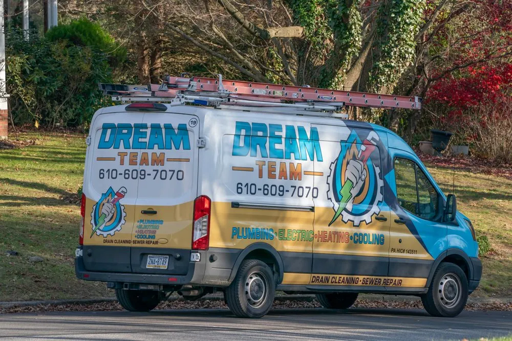 Slide of Dream Team - Plumbing, Heating, Cooling, & Electric