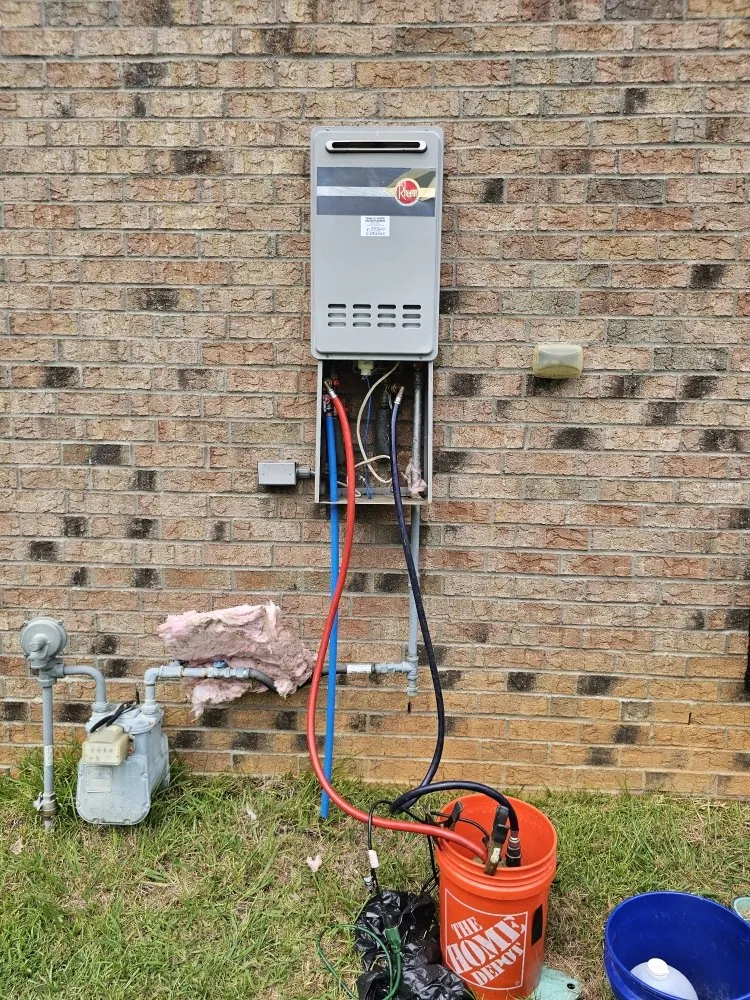 Professional drain cleaning service in Elgin, SC - Drill sergeant Reese tankless hot water heater service