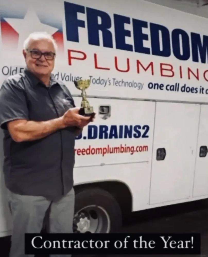 Slide of Dymek's Freedom Plumbing