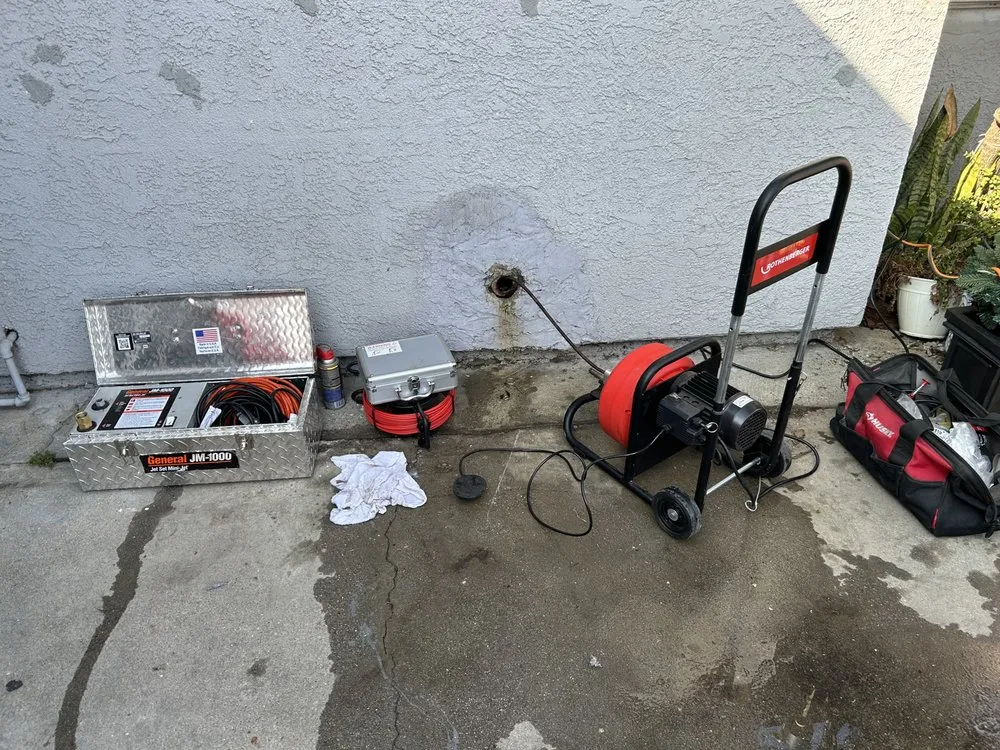 Slide of Dynamo Plumbing & Drain Cleaning